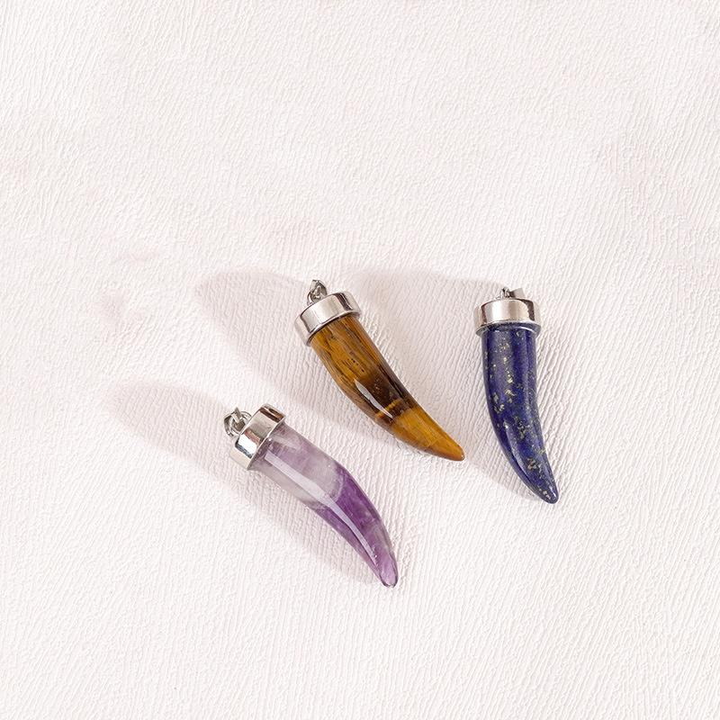 Natural Carved Crystal Wolf Tooth Pendant